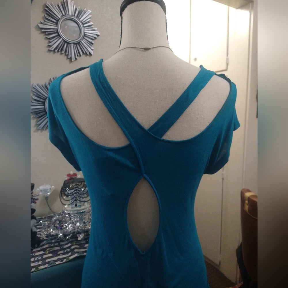 Cross strapped back blue top